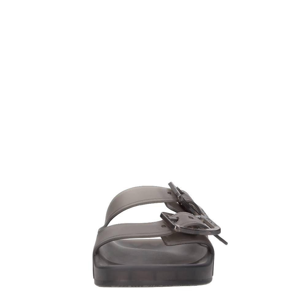 BALENCIAGA Mules in gomma trasparente Convenienza