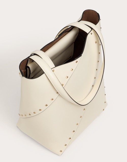 Red Valentino BORSA SHOPPING VALENTINO GARAVANI VALENTINO GARAVANI ROCKSTUD WISPY IN VITELLO Consegna Veloce