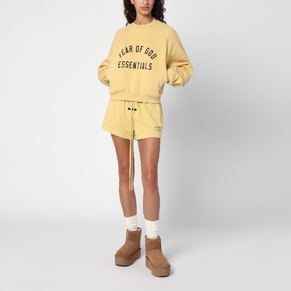 Fear of God Essentials Felpa cropped ambra con logo Offerta temporanea