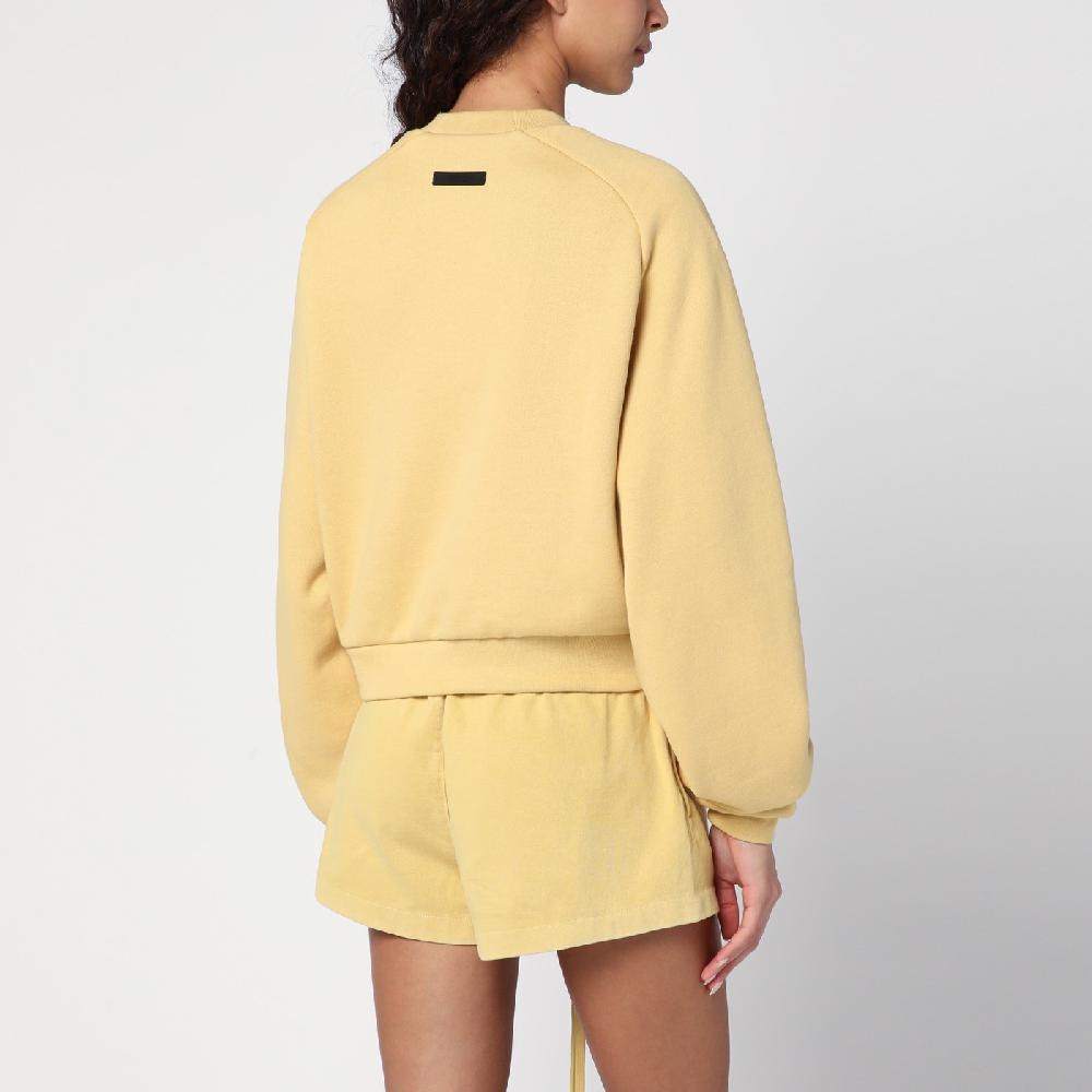 Fear of God Essentials Felpa cropped ambra con logo Offerta temporanea