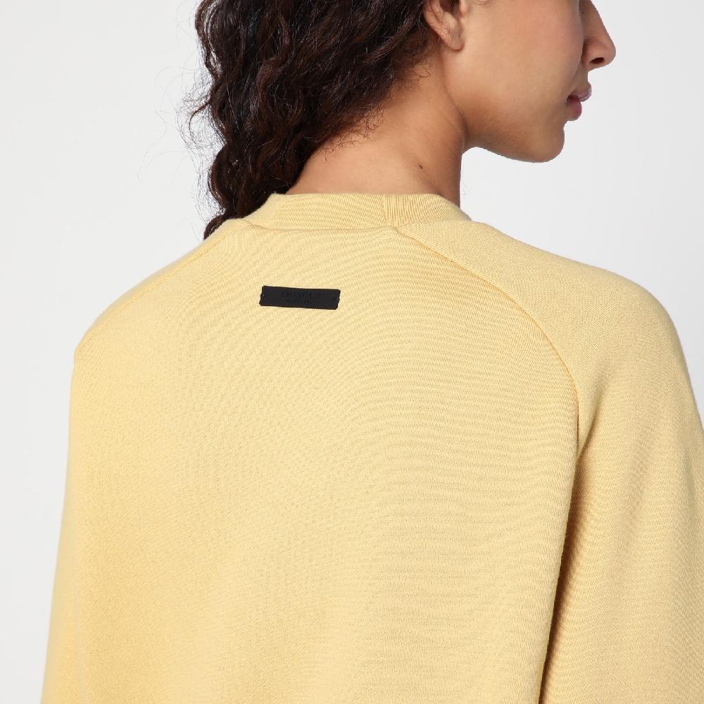 Fear of God Essentials Felpa cropped ambra con logo Offerta temporanea