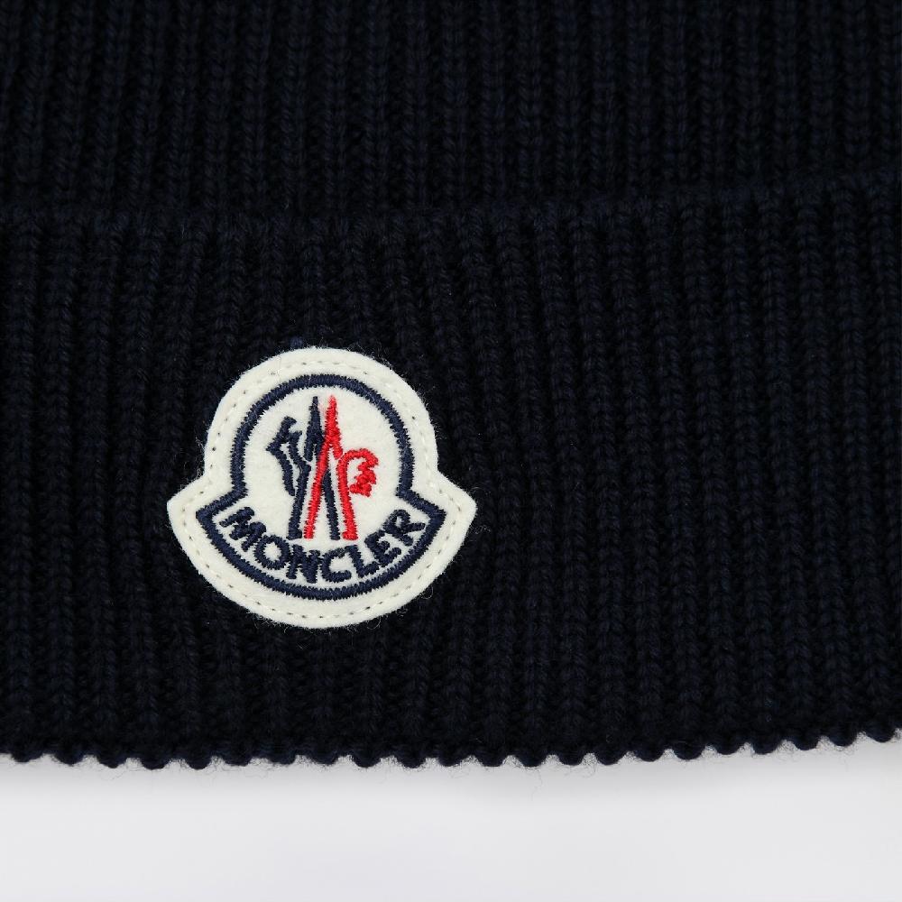 Moncler Cuffia blu in lana con patch logo Solo un giorno rimasto